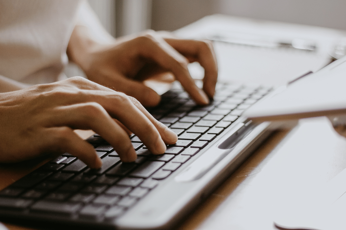 a person using a keyboard for a purpose